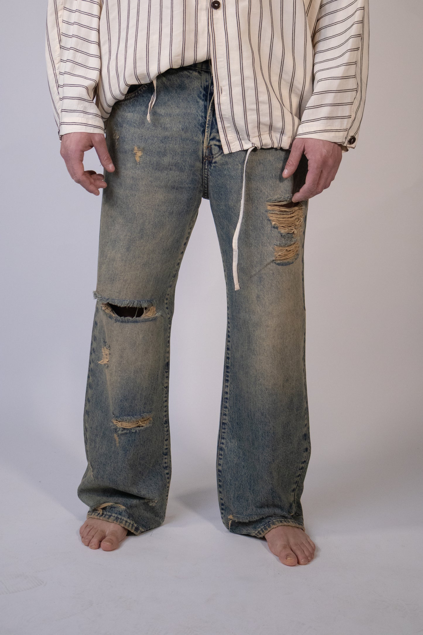 Jeans Gamba Ampia con Rotture